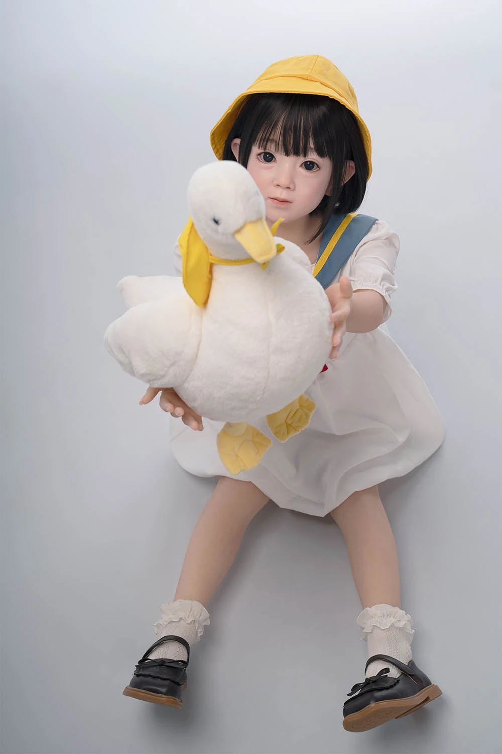  a baby doll born from an old lady